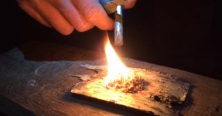 Firelighting with birch bark and sparks